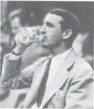 Robert McAlmon drinking, 1928